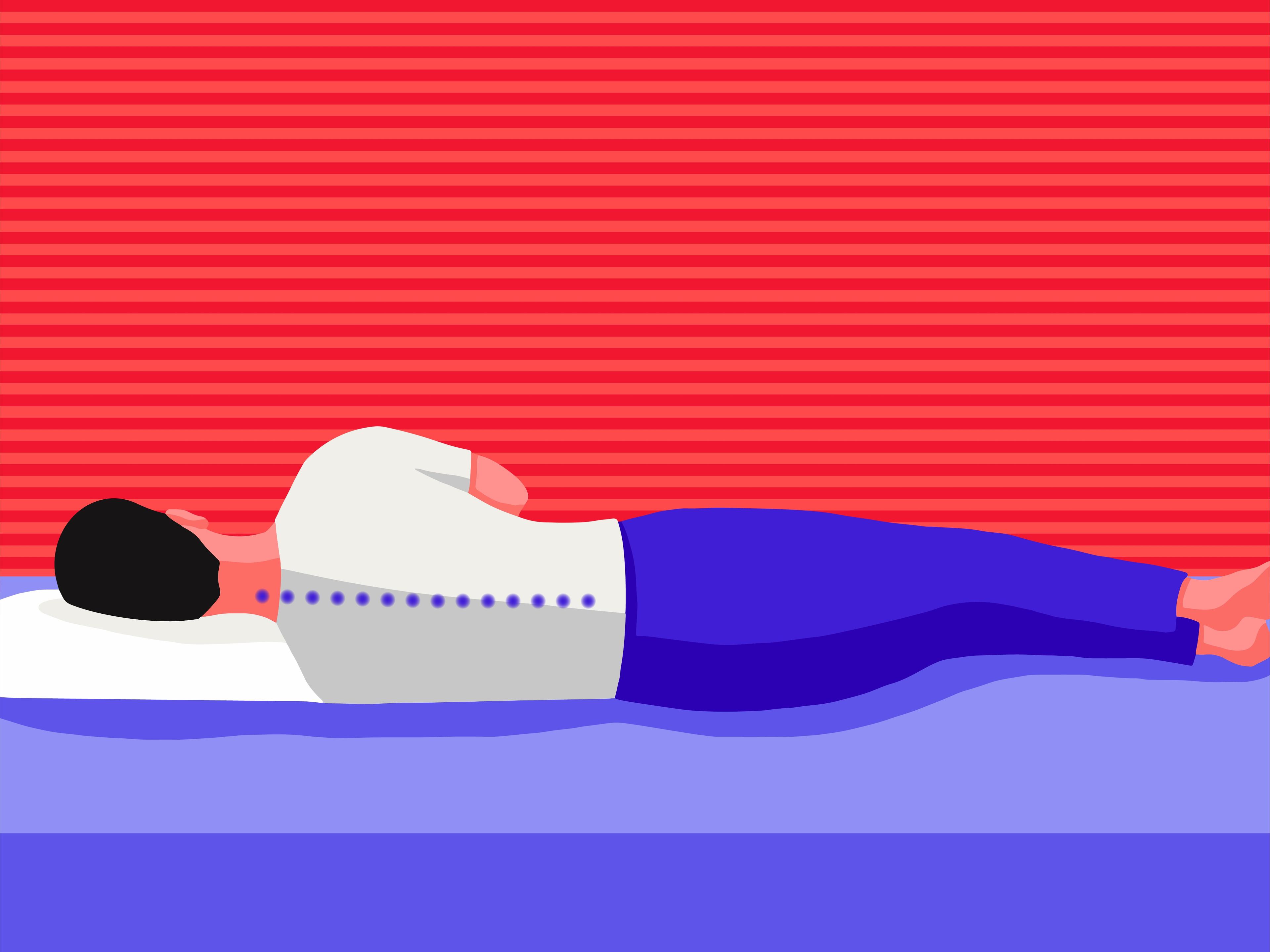 A male sleeping on his side showing the correct alignment of the spine.