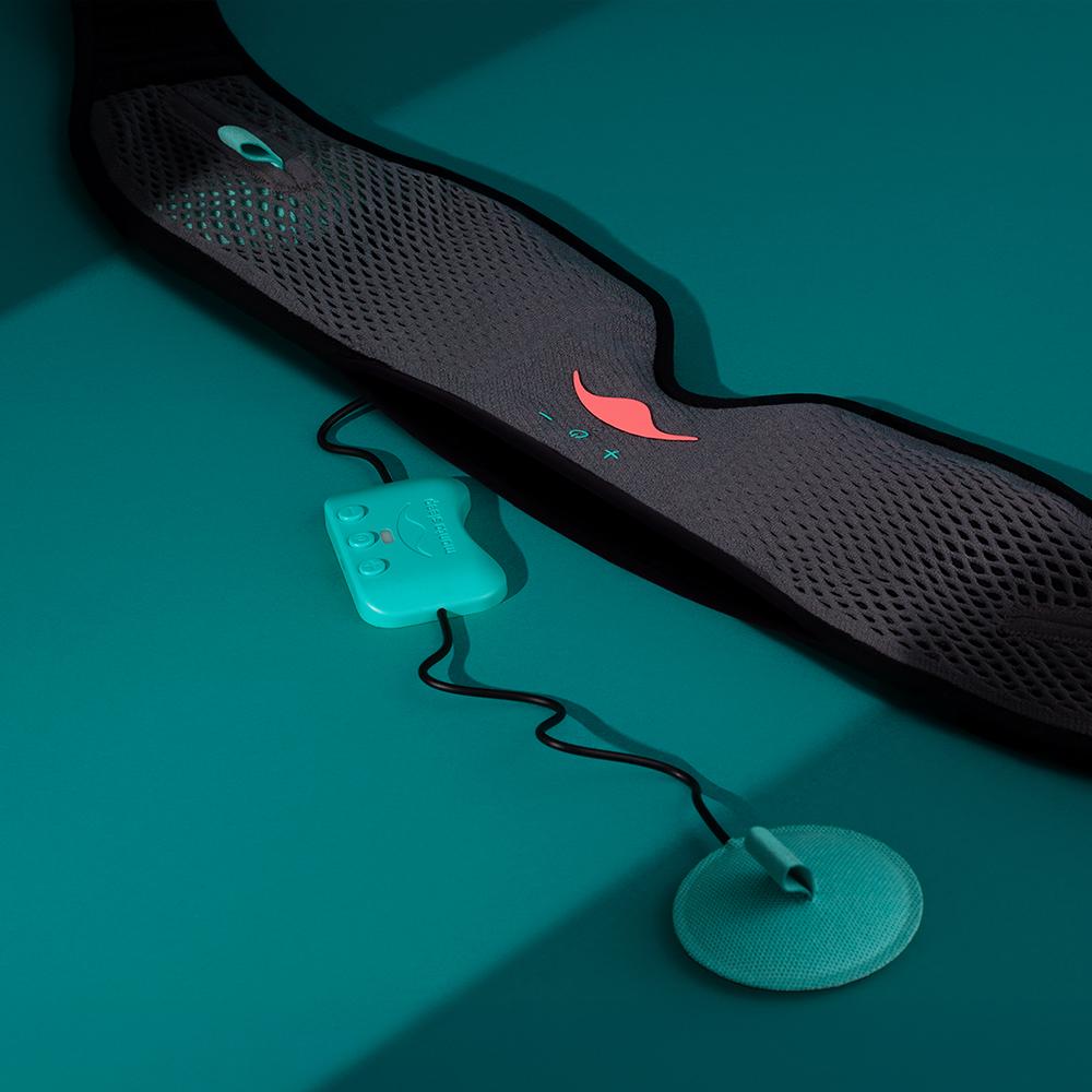 The head strap of a gray mesh sleep mask with a blue control pad and speaker coming out of the top portion.