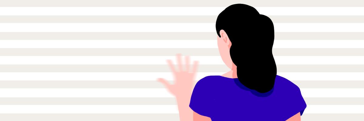 A girl with blurred vision staring at her hand.