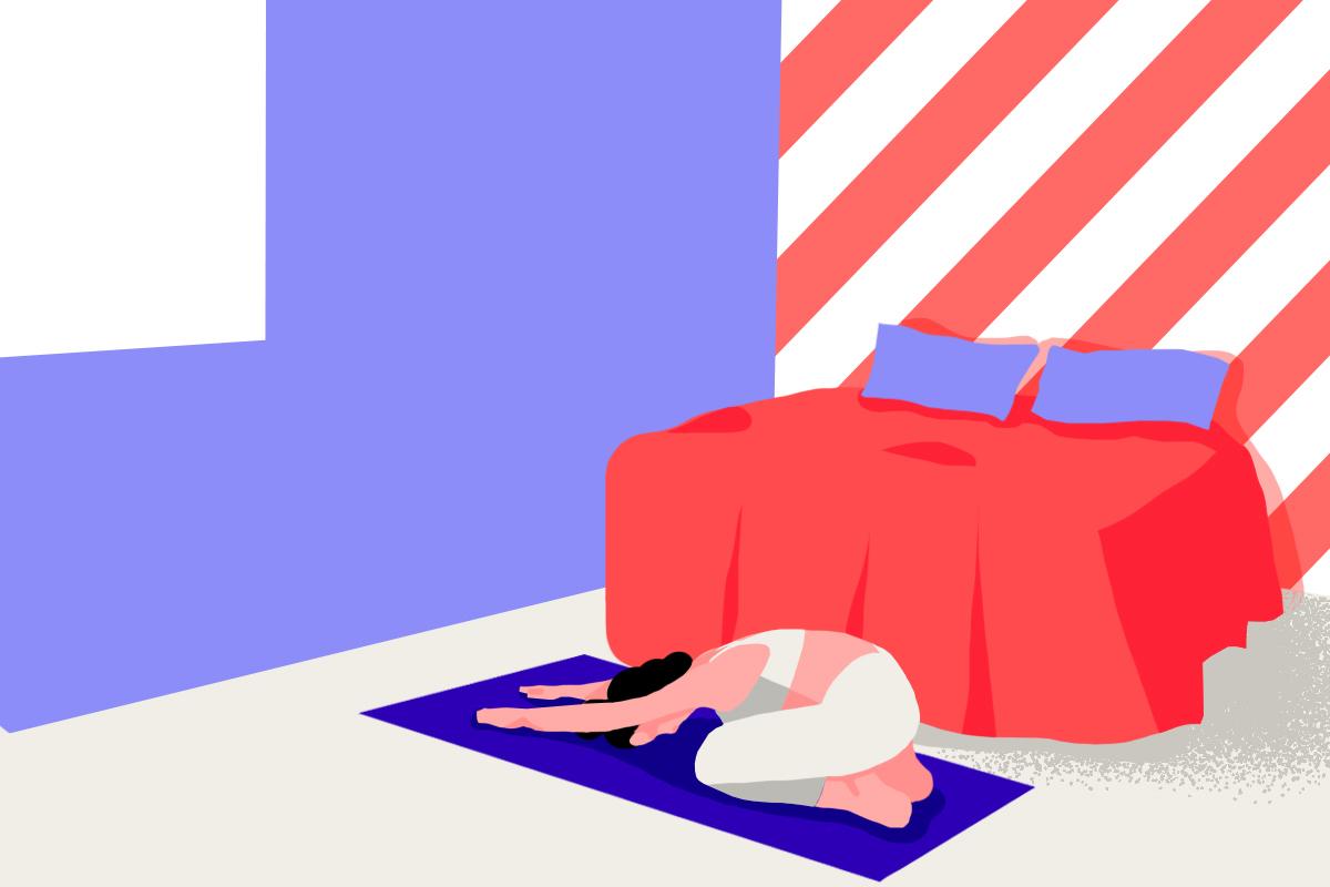 A girl exercising before bed doing the yoga child’s pose in her bedroom.