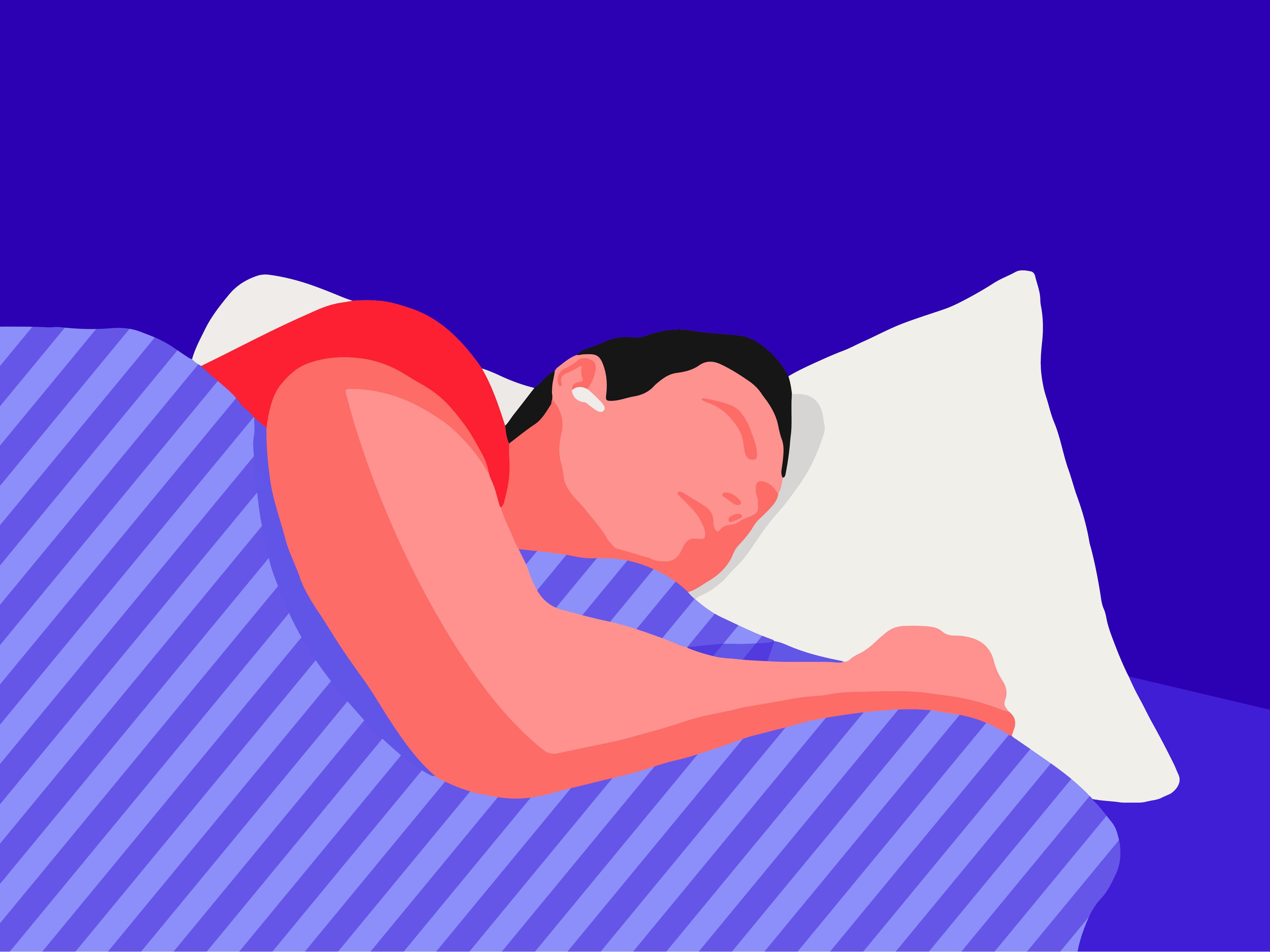 A sleeping man wearing earbuds while lying down in bed.