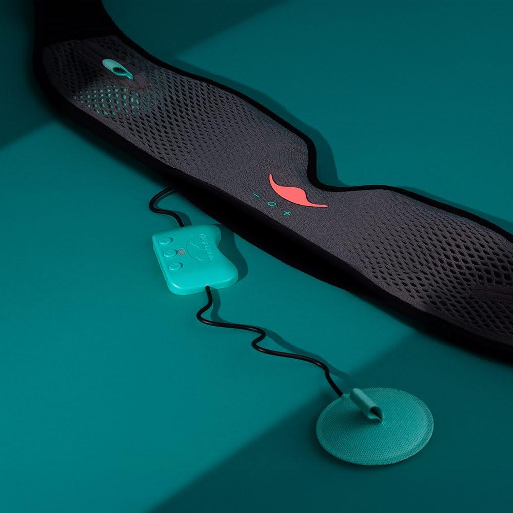 The head strap of a gray Bluetooth® sleep mask. The removable speaker and other electronics are seen coming out of the top portion of the mask.