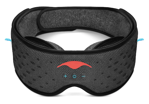 A black sleep mask with headphones and eye cups.